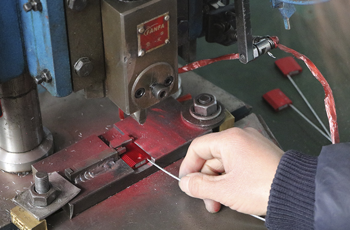 Industrial worker inspecting a manufacturing process
